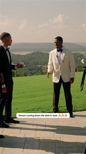 Groom came with the energy: groom coming down the aisle in style