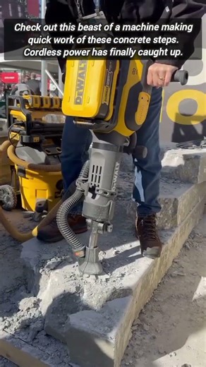 Professional Battery Powered Demolition Hammer Breaking Thick Stone Blocks