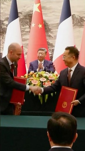 Xi, Macron Sign Wide-Ranging Deals in Beijing