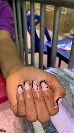 Explore Elegant Short Black Nail Inspirations