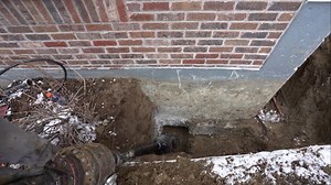 Watch our team in action as we install a piering system to lift and stabilize this settling foundation! | JES Foundation Repair | Facebook