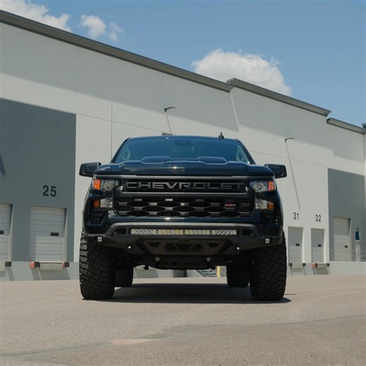 Enhance your Chevy Silverado’s aggressive exterior styling and front-end clearance with ADD Offroad’s Stealth Fighter Front Bumper. The bumper’s center light mount can run one 40” radius light bar or ten 3” pod lights for an elevated look and improved visibility in low-light conditions. Our Chevy 1500 Stealth Fighter is proudly made in the USA! Key Features: • Low-Profile Fitment • Center Mount for (1) 40” Radius Light Bar or (10) 3” Pod Lights • (2) Pod Light Mounts in Wings • Pair of 1” Thick 