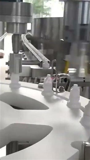 How eye drop capped on by the spray filling machine?