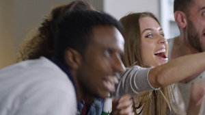 Two Couples Sitting On The Couch, Eating Snacks And Celebrating Team Victory Watching Tv | Free Stock Video Footage