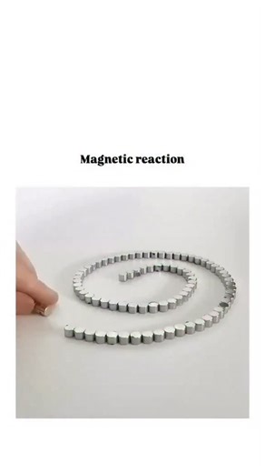 ENTERTAINMENT | - The video depicts a hand gently lifting and releasing a chain of small neodymium magnets, causing them to coil, stretch, and reform due... | Instagram