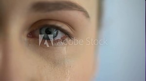 Sad woman crying, suffering pain eyes full of tears, domestic violence victim