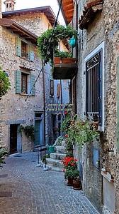 5.4K reactions · 299 shares | A tiny medieval lane in Pieve di Tremosine. Stone walls, soft light, and that timeless Italian atmosphere — all packed into one perfect little corner above Lake Garda. Some streets don’t just lead somewhere… they tell a story. "Pure medieval charm." Because Italy’s beauty often hides in its smallest places. ✨ | Sogno Italiano | Facebook