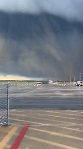 Pilot Lands Plane Amid Swirling Tornado Kansas City, Kansas — April 14, 2024 In a heart-stopping display of aviation skill and sheer luck, a commercial airliner was captured on camera landing at a regional airport just moments before a massive tornado crossed the tarmac. The footage, which has since gone viral, shows the aircraft fighting intense crosswinds as the sky turns a menacing shade of gray and a debris-filled funnel cloud looms in the background. As the plane touches down, a powerful gu