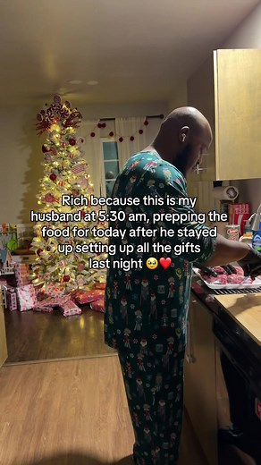 Supportive Husband Prepares Meals During Pregnancy