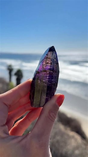 Rocks for the Spirit on Instagram: "Dreamy, Color-Shifting Tanzanite Crystal💜💙 (Natural and Unheated - 467 ct) ✨Available✨ Tanzanite is more rare than Diamonds because it is only found in one location, Merelani Hills, Tanzania. Tanzanite is known for its intense pleochroism, shifting from tones of blue to violet when viewed at different angles, especially in front of polarized light (a white computer screen). Most Tanzanites are heated after they are found to bring out the blue-violet color an