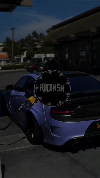 Purple Sports Car Refueling at Gas Station