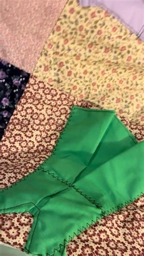 I thrifted this quilt a few months ago and each square has these little dresses attached, I went and removed those from each square and now left with the basic look, if you have ideas on what to do with the little dresses let me know! Stay tuned on how I repurpose the thrifted quilt.. #repurposedmaterials #quilting #thrifting #sewing | Artful Revival