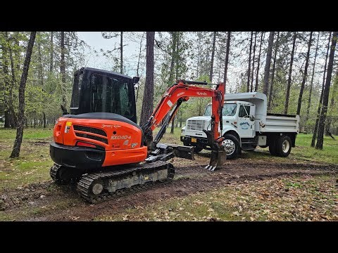 Thunderstorm tree topping & cleanup with the Kubota KX 040 4 excavator