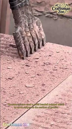 The stonemason chiseled stripes on the surface of granite with a multi headed pointed chisel