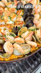 Summer is coming!! Little cookout for @tfhair bday!!! 2 paellas .. chicken thighs, rabbit sausage & beans .. seafood w/crab, scallops, shrimp, clams & mussels #livefire | Michael D. Symon