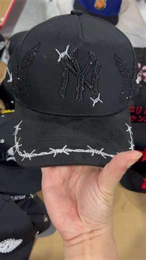 New York Yankees baseball cap custom barbed wire embroidery and rhinestone embellishments.