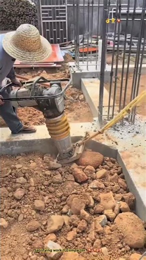 Handheld Compactor Machine : “ Compacting Foundation With 2 operators .”