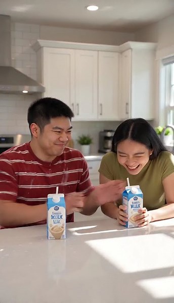 Squeezing milk boxes turns into a messy revenge prank! 😂🥛 #couplecomedy #pranks #funny #funnycouple