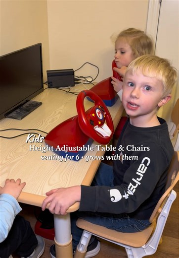 Hilarious, how Jack of the South think mom has lost her mind once she got them a new table and chair set to play at. This adjustable table and chairs will grow with your children until they are well up in age. We got this one, my son, my youngest son was two years old And it has six chairs and fits a child from the age. They can see it all the way up until at least 12 or older, this table has multiple different height adjustments and so do the chairs. We love this table so much that we got two o