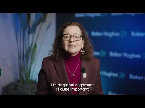 What role does global alignment play in scaling sustainable energy technology?