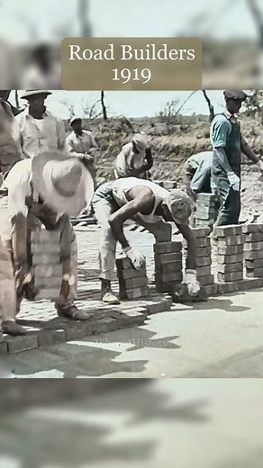 In 1919, road workers built entire streets by hand — lifting, placing, and leveling every single stone without machines. Would you be able to do this? 🎨 Restored & colorized by Vibrant History #historicalfootage #colorized #history | VibrantHistory