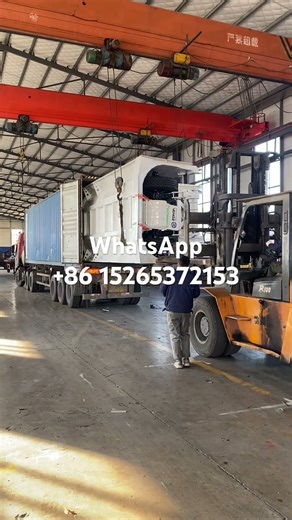 Dump trailer load in container