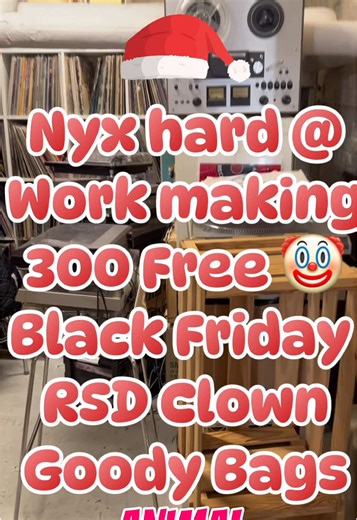 Nyx hard work in Santa‘s workshop in the basement. of animal records assembling 300 goodie bags that we will away for free on November 28 for Black Friday record store day. They include an adorable clown on a swing wearing an animal records button plus our newest sticker and more, packaged in the coolest doggy bag! Sign up for our new email updates and get this insane limited edition goodie bag (a $30 value) for free! We open at 8 AM on November 28 Black Friday, so make sure to plan to be at the