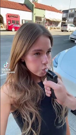 Woman blowing breathalyzer #meme