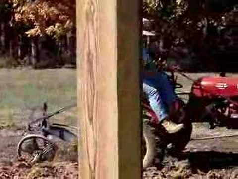 Farmall cub pulling a disk plow