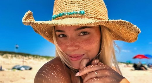 "4th Year's the Charm: - Olivia Dunne Turns Heads in See-Through Laced White Bikini for Sports Illustrated 2026 Swimsuit Issue