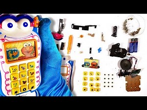 See All The Parts Inside A Kids Sesame Street Elmo Toy Cell Phone