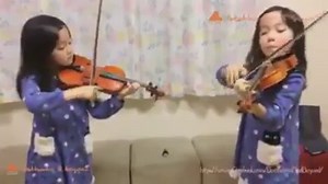 Beautiful little twin sisters playing a duet violin version of the amazing childern's piece "Across the Black Keys". https://www.youtube.com/watch?v=dLGOBS3y3w4 | The World Music