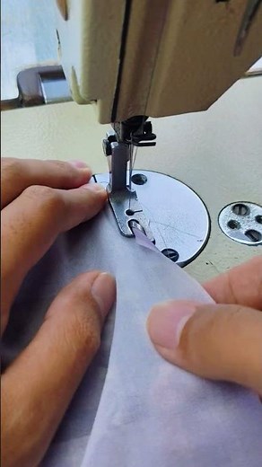 sewing the edge of the fabric using a hemming foot #sewingtechniques