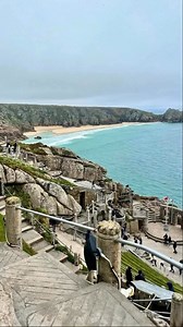 In Cornwall, The Minack Theatre is an open-air stage carved directly into the granite cliffs, overlooking the churning turquoise waters of Porthcurno Bay. #travel #cornwall | UK Hidden Gems