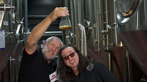 Watch Alex Lifeson and Geddy Lee visit a "beer factory" to launch Rush Golden Ale