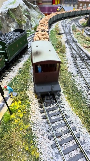 Peco 3 way point passed over by Standard class tank 2-6-4T 80104 pulling boulder freight .