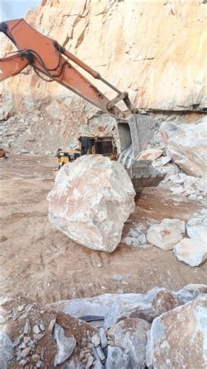 "Loader & Excavator Moving Rocky Boulder — Heavy Duty Power!"