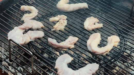 Grilled intestines to crispy texture. Chinchulin is the small intestine of an cow used in cooking, especially in Argentine, Uruguayan, and Paraguayan cuisine. High quality 4k footage