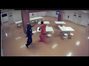 New video from inside the Cuyahoga County jail shows corrections officer allegedly assaulting inmate