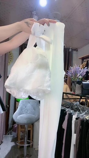 Exploring Textured Garments in a Modern Clothing Store