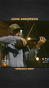 🌾🎶 "Seminole Wind" by John Anderson echoes with the haunting beauty of the South, where nature and memory intertwine under a restless sky. 🌬️🌿 #JohnAnderson #SeminoleWind #CountryMusic | Classic Country Nation