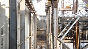 Walking around the derrick of the offshore drilling rig to money board, fingers, and pipe racking system