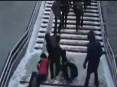 People falling on icy stairs