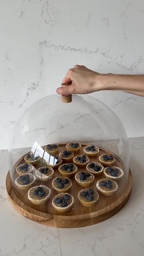 5-INGREDIENT LEMON BAR BITES. 🍋 🫐 These mini desserts are perfect for your next book club or brunch, and they are incredibly easy to make. Save this recipe. 👇 1 tube store-bought sugar cookie dough 1 jar blueberry jam 1 large jar lemon curd Blueberries Powdered sugar 1. Pop 1 tbsp of cookie dough into each cup in a mini muffin pan. Bake at 350℉ for 10 minutes or until just golden. Press the back of a measuring spoon into the dough to shape in into a cup. Remove from the pan and cool. 2. Place