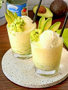 Beat the heat with Avocado con Yelo! 🥑 It's a refreshing Filipino classic that’s creamy, cool, and just the right amount of sweet. All you need are ripe avocados, crushed ice, milk, and a drizzle of condensed milk! 🥤😋 What's your favourite summer treat? Ingredients: 2 ripe avocados 1 cup crushed or shaved ice 1 cup cold milk (evaporated milk for extra creaminess, or oat/almond milk if dairy-free) 4 tbsp sweetened condensed milk (adjust to taste) 1–2 tsp sugar, optional Scoop of ice cream of c