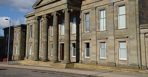 Prisoner choked female guard after they were left alone in hospital waiting room