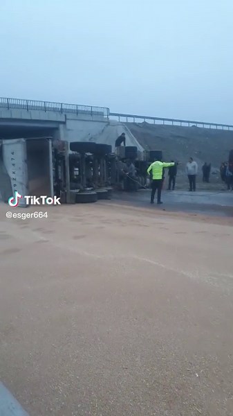 Overturned Truck Incident Observed by Bystanders