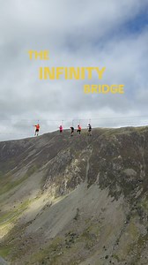 ✨ Step into the clouds… if you dare. ✨ The Infinity Bridge at Honister Slate Mine is the highest of its kind in England! A heart-pounding walk, 1,000 feet above the Borrowdale Valley floor, surrounded by breathtaking Lake District views. 🏔️ Dare to take the most unforgettable step of your life? 🌄💨 #InfinityBridge #HonisterSlateMine #LakeDistrict #VisitEngland #EpicViews #AdrenalineAdventure #BridgeGoals #StepIntoTheSky #SkyHighViews #EdgeOfTheWorld #NatureRush #BucketListExperience #ViewFromT