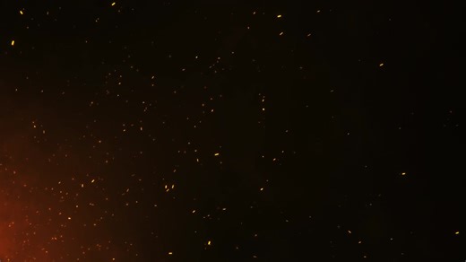 4k fire particles burning red hot sparks fire glowing particles on black background overlay fire | Premium Stock Video Footage