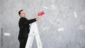 Man in suit throwing money. Successful business or winning the lottery. cash cannon money gun. Slow motion